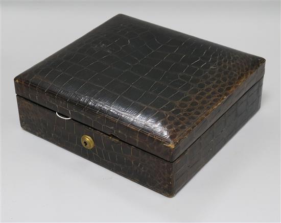 A crocodile jewellery box c.1910-1920 height 9cm width 26cm depth 24cm